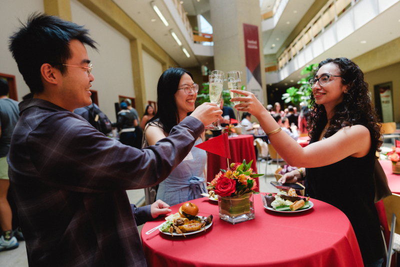 GSE students toast at Welcome to Alumni event