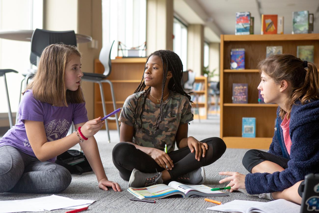 Middle school students in a school library