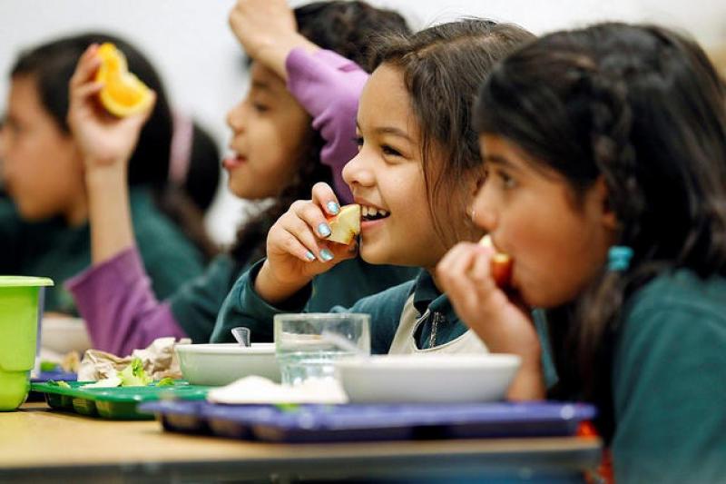 Photo of kids eating healthy food
