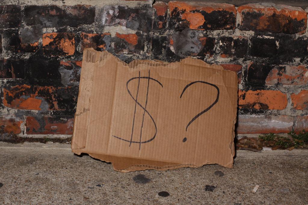 Picture of sign asking for money